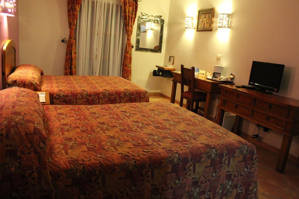 Hotel Casa Conzatti Oaxaca Номер фото